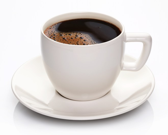 Coffee cup and saucer on a white background.