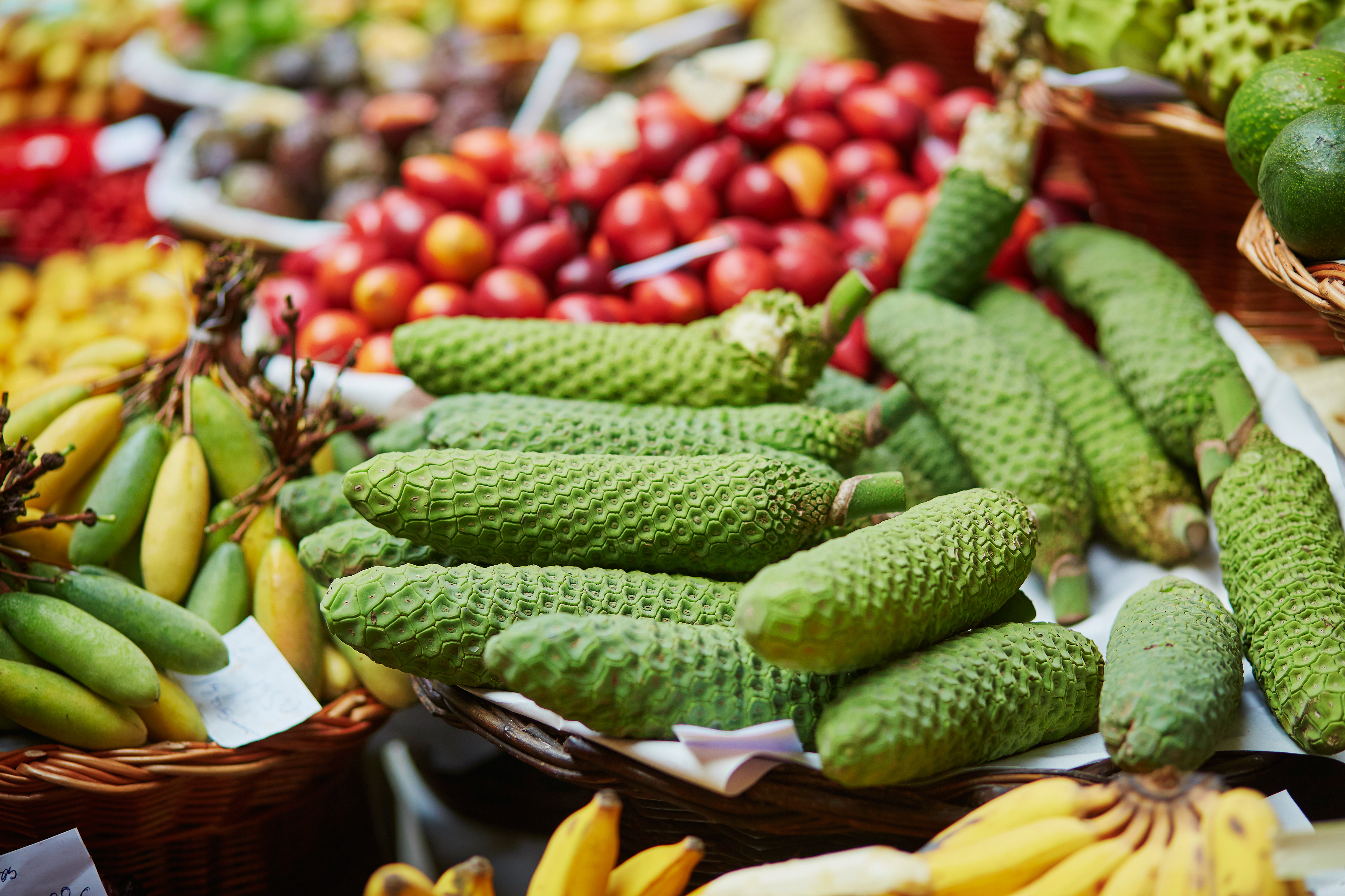 Exotic fruit of monstera deliciosa on market Mercado dos Lavradores, Madeira island, Portugal